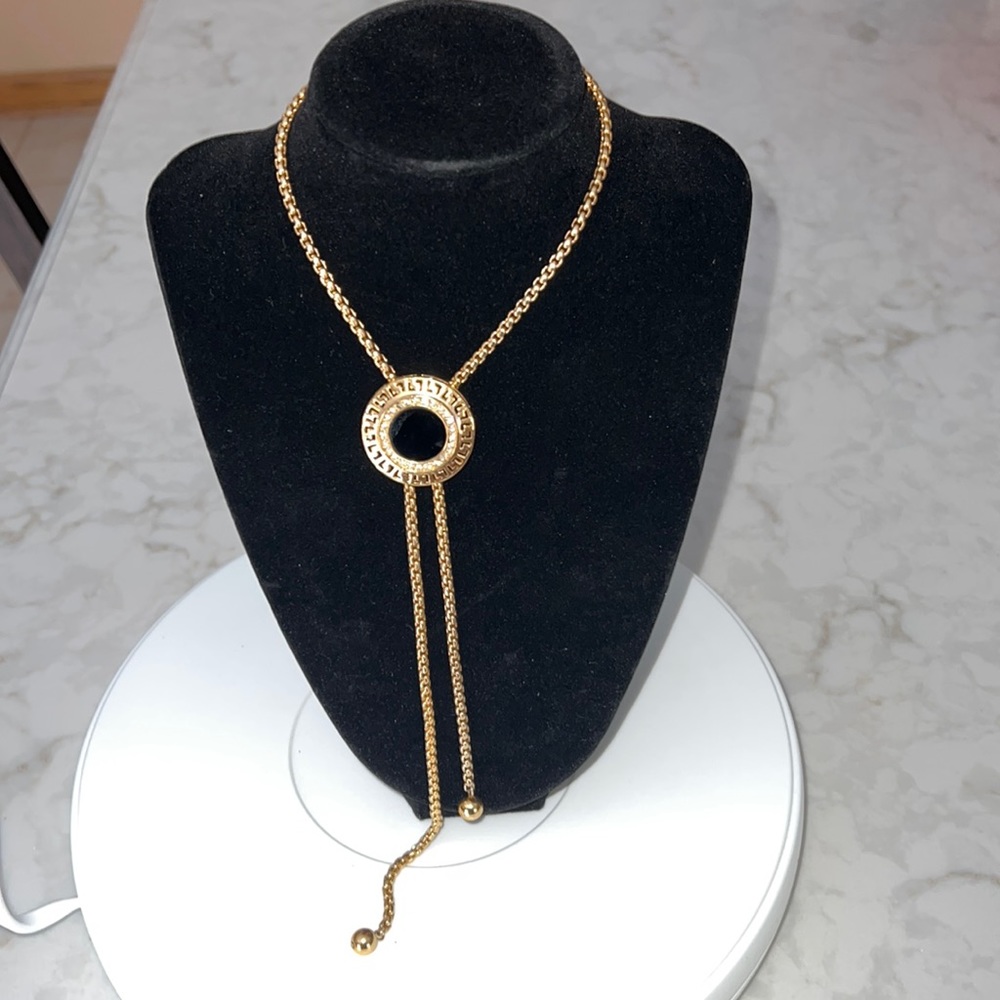 Greek key necklace.